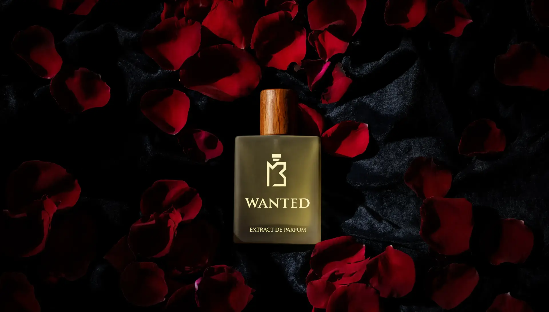 WANTED extrait de parfum among red rose petals